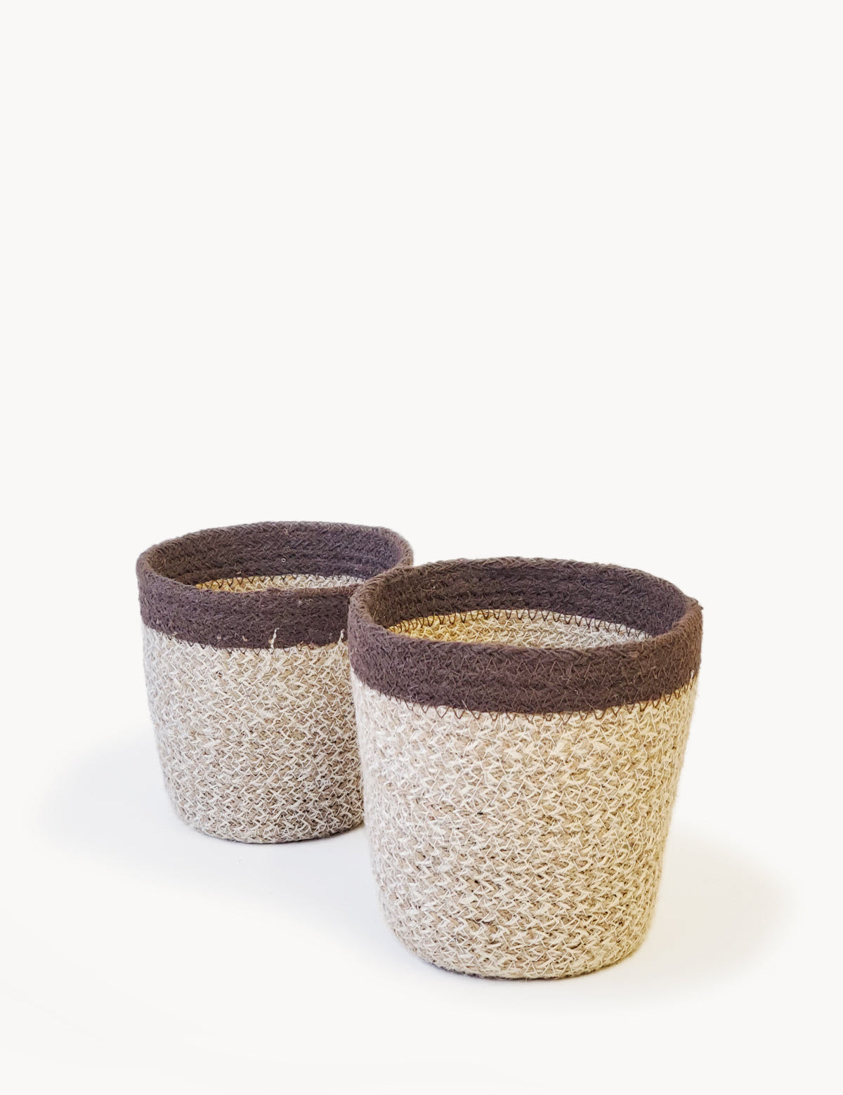 Natural, white, Brown. sturdy planter woven from soft jute yarn. 2 sizes; small and large. sustainably handmade.