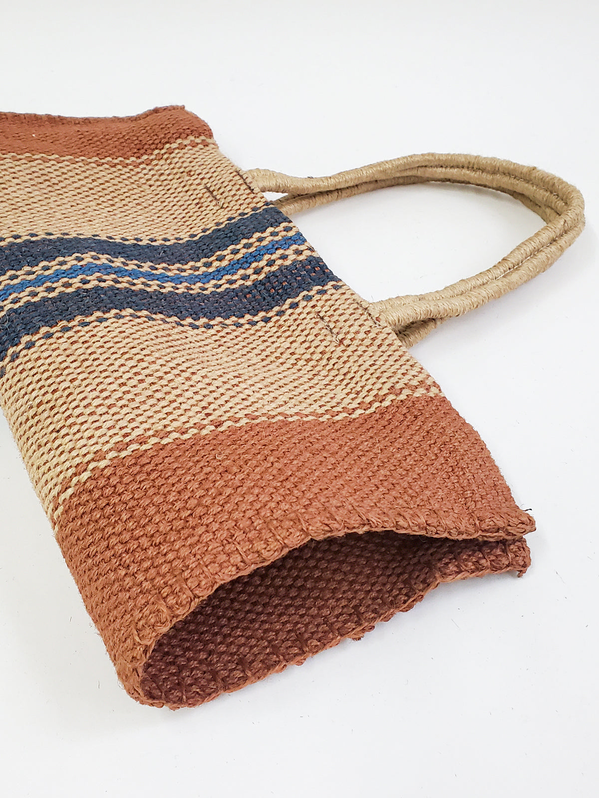 Approximately 16”tall x 16"wide / Handle drop 7". 100% Handwoven Jute Fabric. Color Natural, Brown and Multicolor. Handmade. Sustainable. Jute Tote bag.