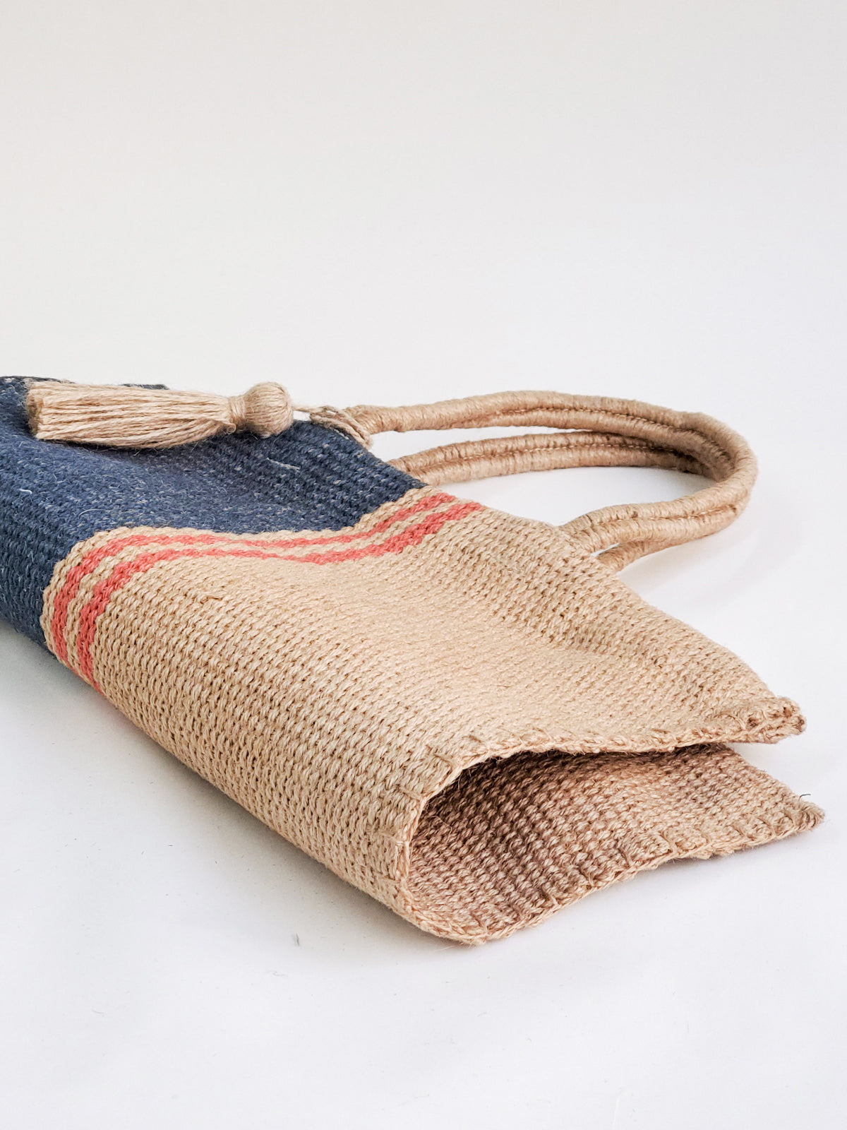 Approximately 16”tall x 16"wide / Handle drop 7". 100% Handwoven Jute Fabric. sustainably handmade. Reusable Market tote bag. Natural, Navy and Red.