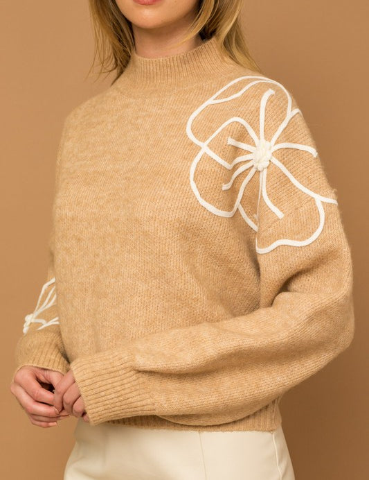 Flower Embroidery Mock Neck Sweater. taupe knit sweater with large white embroidered flowers.