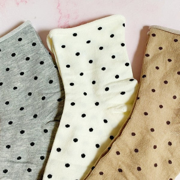 set of 3 pairs of socks. polka dot  pattern. white, gray, brown in the pack. soft, stretchy material. 