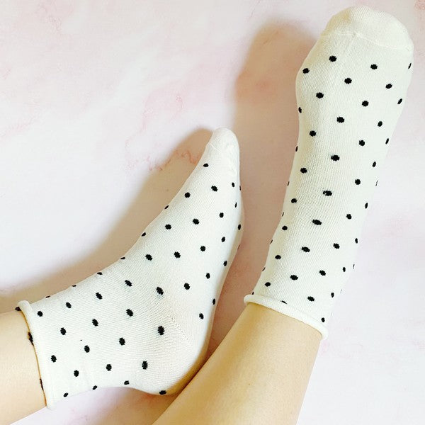 set of 3 pairs of socks. polka dot  pattern. white, gray, brown in the pack. soft, stretchy material. 