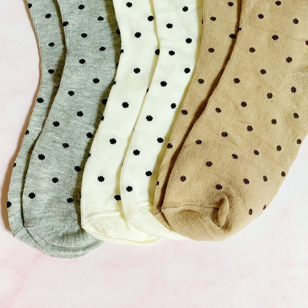 set of 3 pairs of socks. polka dot  pattern. white, gray, brown in the pack. soft, stretchy material. 