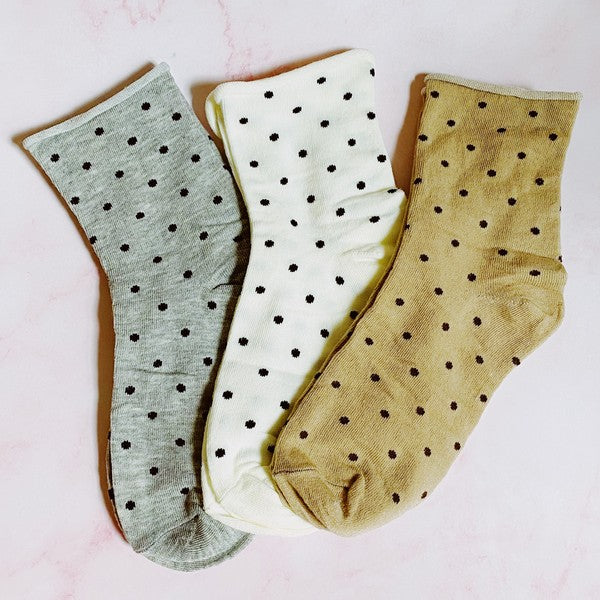 set of 3 pairs of socks. polka dot  pattern. white, gray, brown in the pack. soft, stretchy material. 