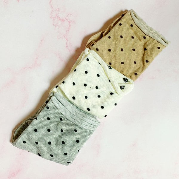 set of 3 pairs of socks. polka dot  pattern. white, gray, brown in the pack. soft, stretchy material. 