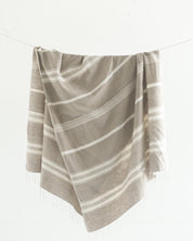  Bath Towel. Measures 38 x 72 inches. Machine wash and dry. ed as bath towels, lightweight shawls and accent throws. AZO-free dyes. hand-woven in Ethiopia. Grey with Natural. 