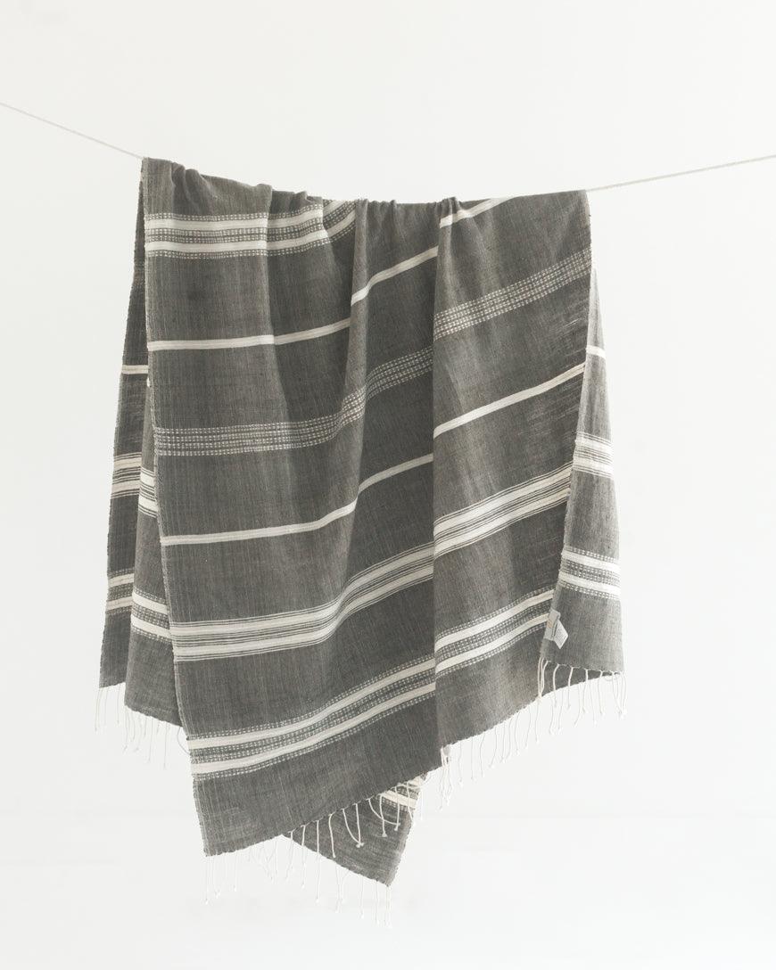  Bath Towel. Measures 38 x 72 inches. Machine wash and dry. ed as bath towels, lightweight shawls and accent throws. AZO-free dyes. hand-woven in Ethiopia. Grey with Natural. 