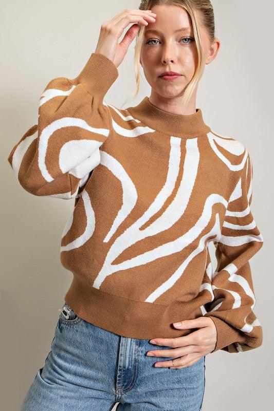 Ziggy Mock Neck Printed Sweater with a swirl print. Puffy balloon sleeves.