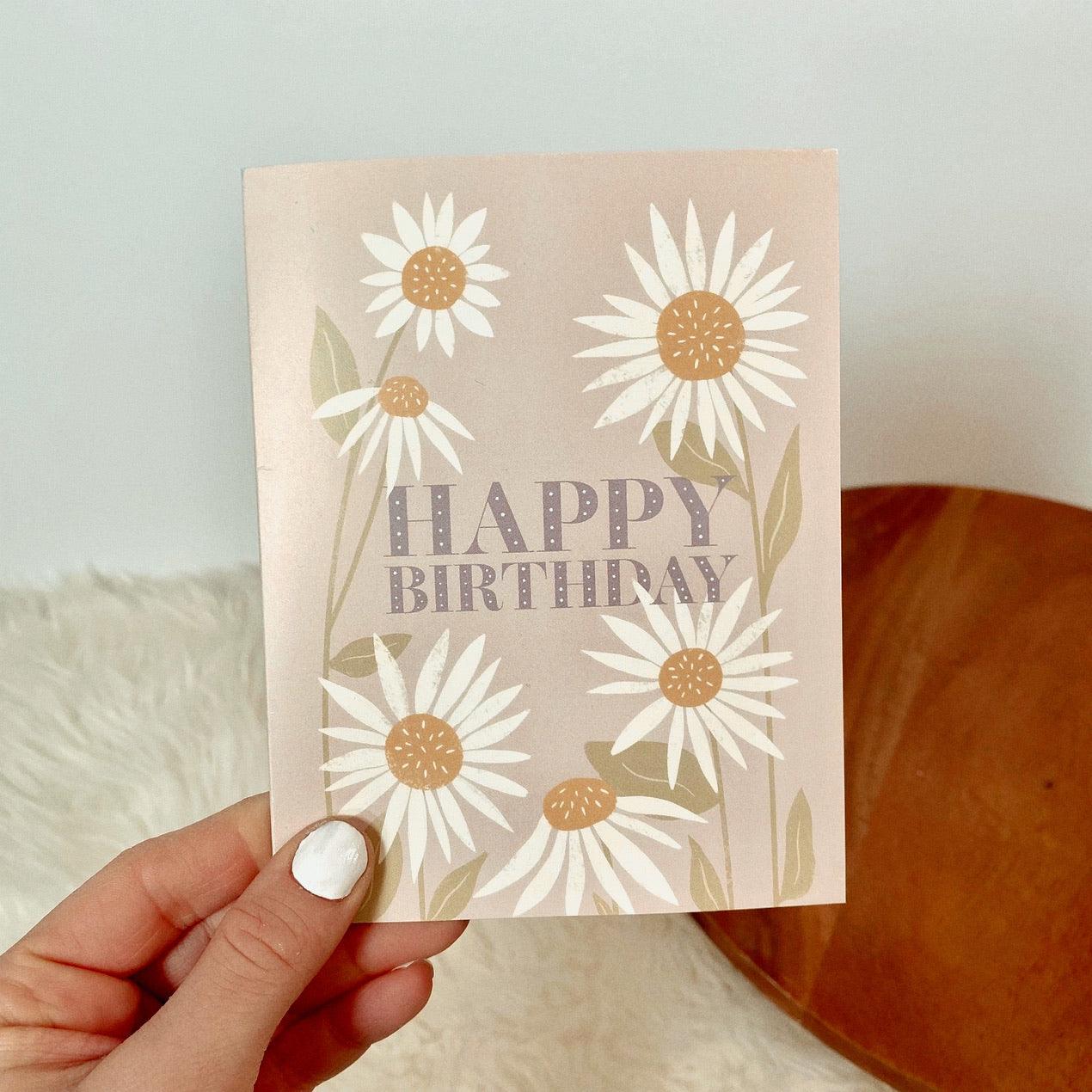 Happy Birthday Card. Hand drawn Daisy design. Birthday Card. Hand holding card. 