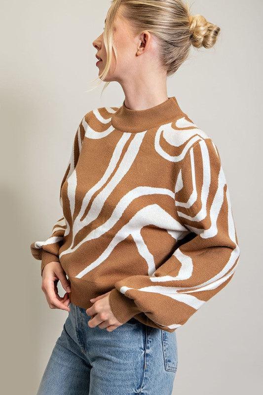 Ziggy Mock Neck Printed Sweater with a swirl print. Puffy balloon sleeves.