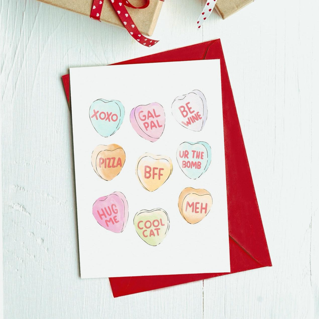 Galentines day Card. Hand drawn candy hearts. Valentine’s Day Card. Flat lay with red card. 