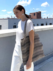 Approximately 15.75”tall x 15.75"wide. 100% Handwoven Jute-Cotton Fabric. color  Black, Off-White.  sustainably handmade. stylish reusable market tote bag. 