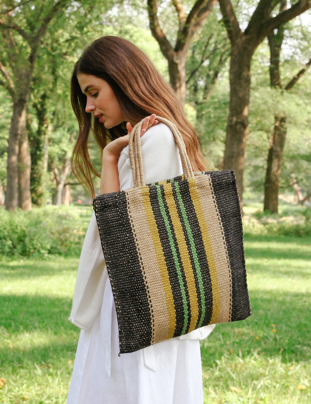  Handle drop 7". 100% Handwoven Jute Fabric. Natural, Navy and Multicolor in color.