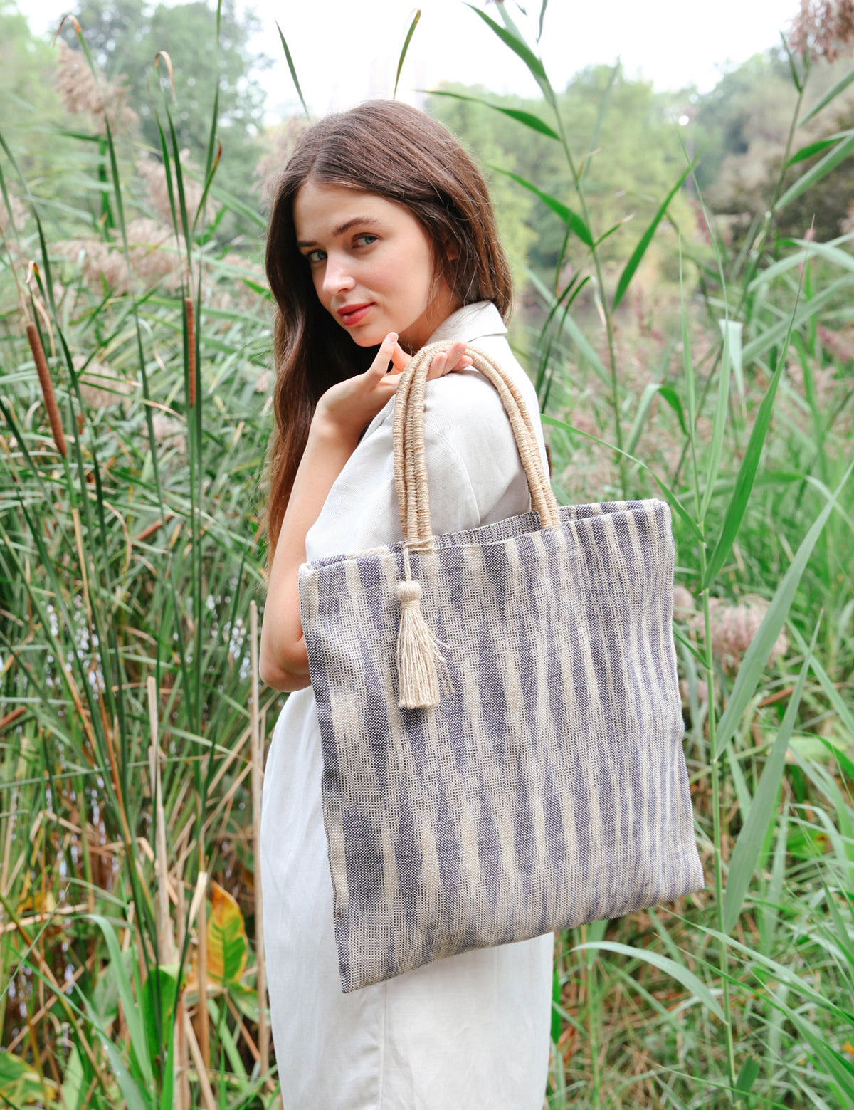  Handle drop 7". Colors -  Natural and Blue. 100% Handwoven Jute Fabric. Ikat pattern. sustainably handmade. reusable tote bag.