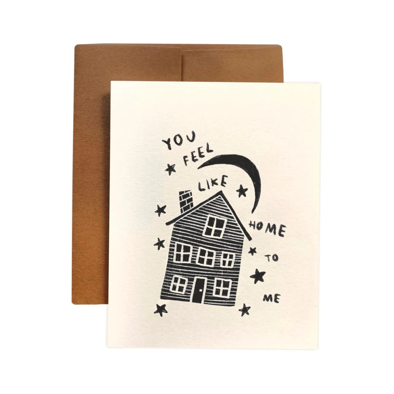 Another way to say I love you. Drawing of home with moon and stars. Handwriting reads: you feel like home to me. Blank Card. 4 1/4" X 5 1/2". Kraft A2 envelope.