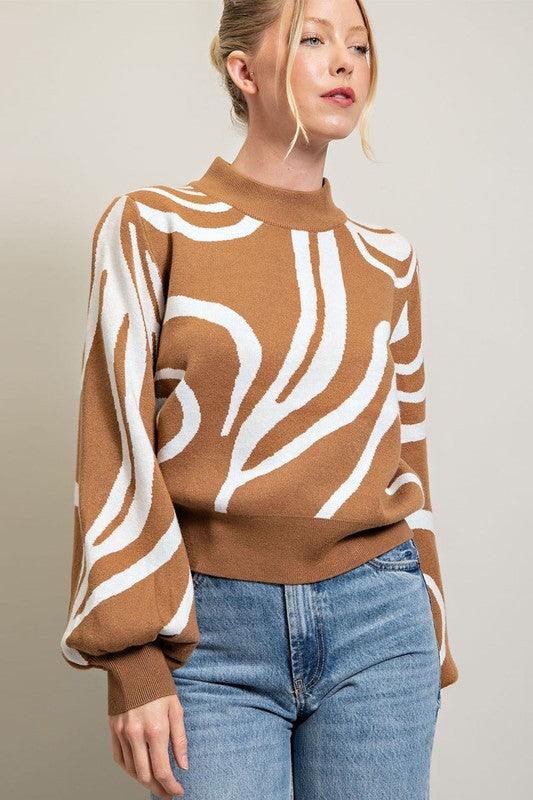 Ziggy Mock Neck Printed Sweater with a swirl print. Puffy balloon sleeves.