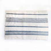 Aden Cotton Bath Mat. 24 x 36 inches.  Hand-spun Ethiopian cotton. woven from thick hand-spun cotton. natural  with navy.. 