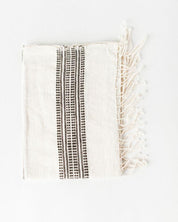 Aden Cotton Hand Towel. Measures 21 x 27 inches. Machine wash and dry.  hand-woven in Ethiopia. 6 color ways. natural with grey. .