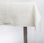 Riviera Cotton Tablecloth. Measures: 50 x 50 inches. hand-woven in Ethiopia from local hand-spun cotton. Natural Color.