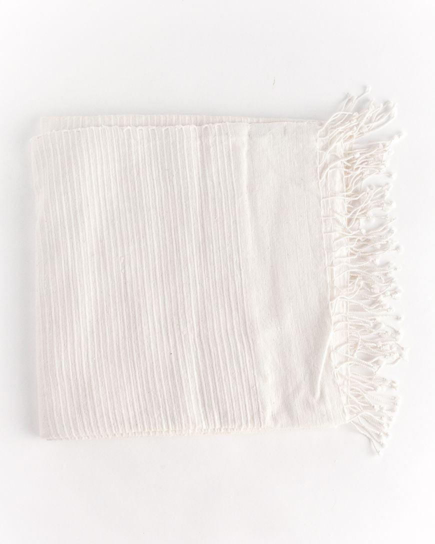 Riviera Cotton Tablecloth. Measures: 50 x 50 inches. hand-woven in Ethiopia from local hand-spun cotton. Natural Color.